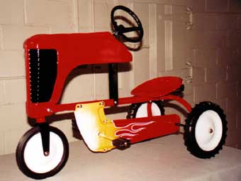 Left view of pedal tractor
